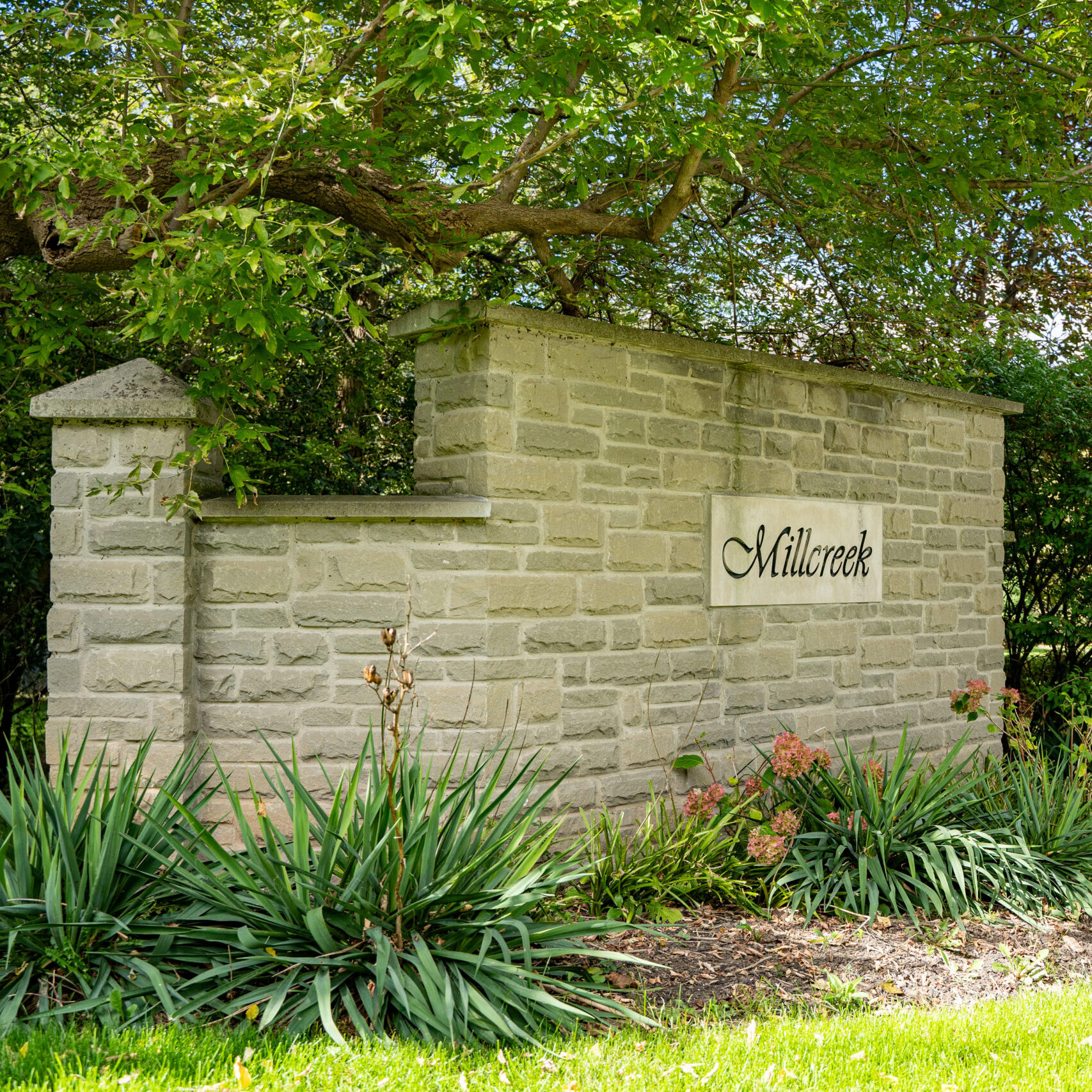 Millcreek neighborhood sign in Hamilton. Hamilton, Canada - January 15, 2025.