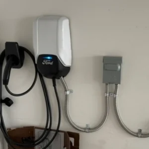 residential EV charger installation in Everett electrician mounting Level 2 charger in detached garage