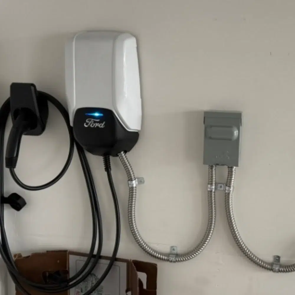 residential EV charger installation in Everett electrician mounting Level 2 charger in detached garage