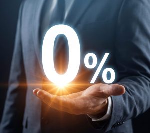 Zero Interest Rate Offer and No Commission Concept with Businessman Holding Glowing 0% Symbol